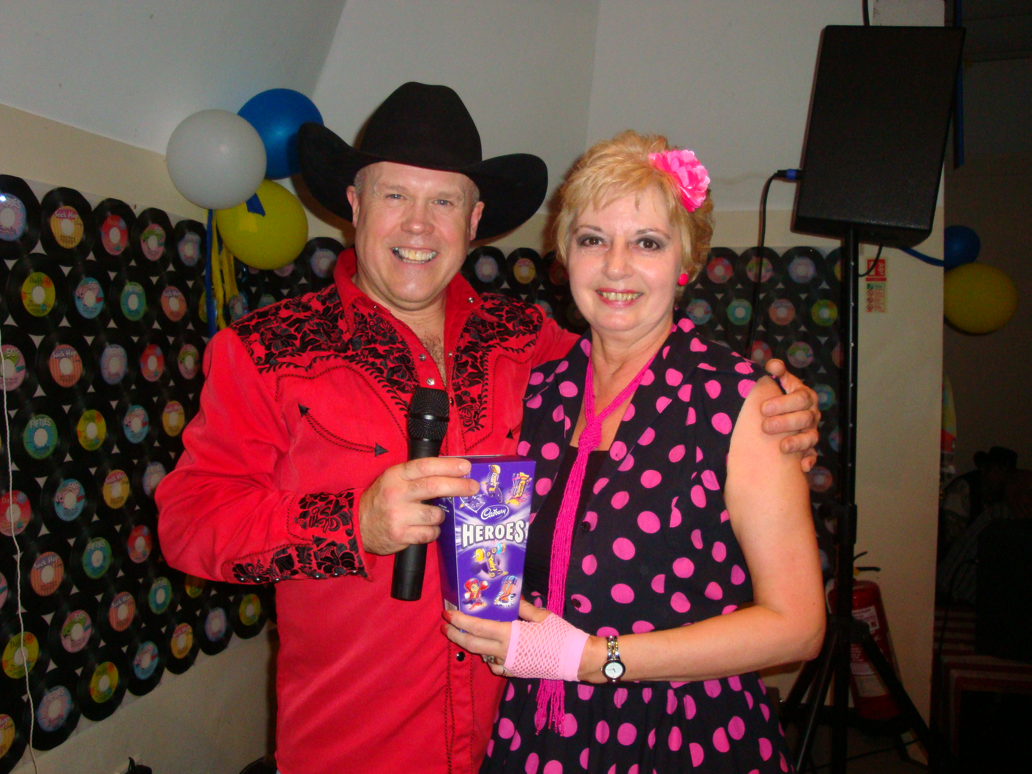 Alan Gregory presenting Sandy with best prize for fancy dress costume - New Year 2011
